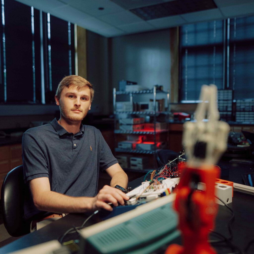 A student working in a robotics lab.
