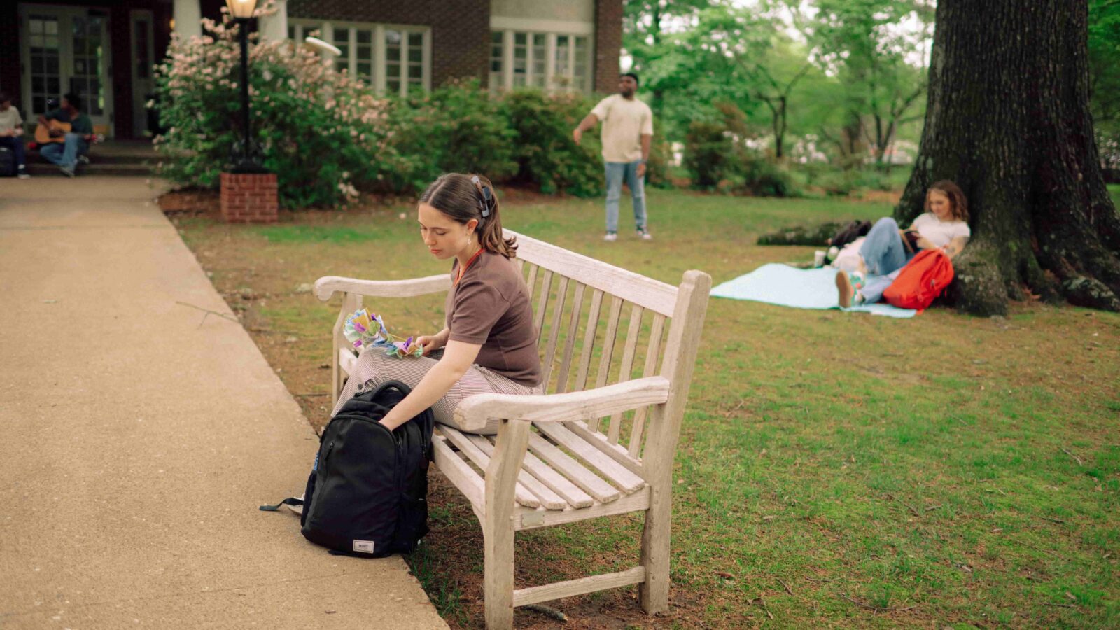 Students involved in various activities outdoors on the Hendrix campus.