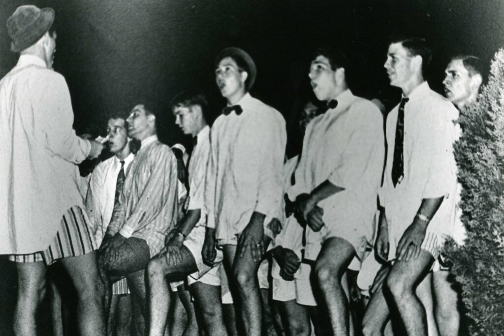 A black and white photo from the 50's showing a group of male students during Shirttails.