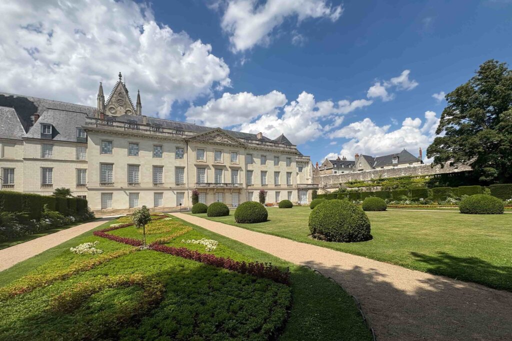 A large chateau with gardens in France.